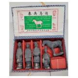 Set Oriental figures in box