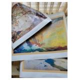 Group of unframed prints