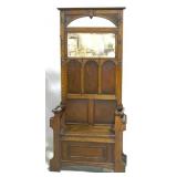 Original finish carved oak hall tree w/ seat