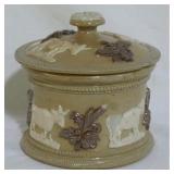 Glazed tobacco jar with cows
