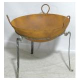 Metal outdoor fire pit bowl on stand