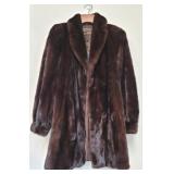 Natural mahogany mink stroller, $14000 value