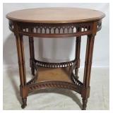 Pierce carved mahogany round table