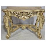 Gilded heavily carved console table