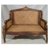 Fancy carved & caned settee