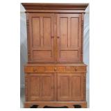 Exceptional spool carved 2 part cupboard