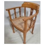 Cane seat arm chair, as is