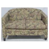 Floral loveseat, leg needs to be screwed in