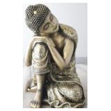 Buddha Statue by Three Hands