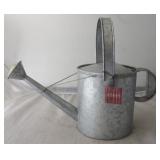 Watering Can by Three Hands