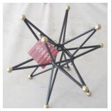 Metal Star Decoration by Three Hands