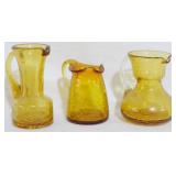 3 Amber Crackle Glass Pitchers