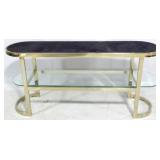 Oval brass console with black top, glass shelf