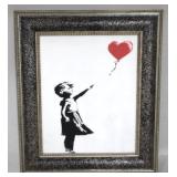 Girl with Heart Balloon by graffiti artist Banksy