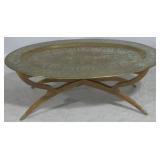 Mid-century heavy brass spider leg table