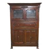 Monumental carved multi compartment armoire