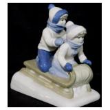 Sledding figurine, 5.5"