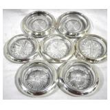 7 Sterling Rimmed Coasters - 4" round