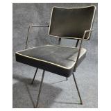 Atomic mid-century swivel arm chair