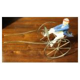 Ceramic Man on Metal Buggy - 6" x 12" x 7"