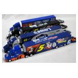 4 NASCAR Tractor Trailers with Cars