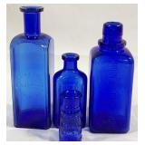 4 Vintage Blue Glass Bottles
