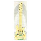 The Hugger Plastic Guitar - 21.5" x 7"