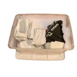 Plastic Tote full of assorted socks & more