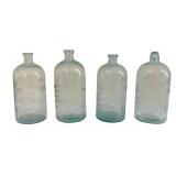 4 Buffalo Spring Water Bottles, 1 Cracked