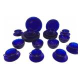 Array of Cobalt Blue Plates, Cups & Saucers