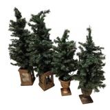 Group of 4 Medium Artificial Christmas Trees