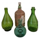 Four Green Glass Bottles Incl Wicker Wrapped