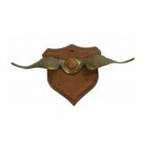 Antique Brass Winged Radiator Cap on Wood