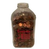 Jar of Pennies in Vtg Tropicana Bottle 10"