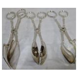 Group of silver plated tongs
