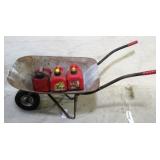 Wheelbarrow with gas cans