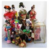 Box lot of assorted asian dolls
