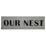 Our Nest sign