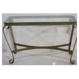 Glass top table with cast iron base