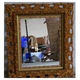 Gold framed mirror
