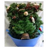 Bucket of assorted christmas decorations