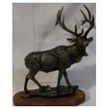 Bronze elk on wood stand