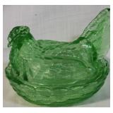 Green glass hen on a nest