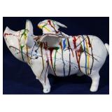 Cast iron paint splattered flying pig
