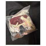 Zip lock baggy of dolls clothes, hats & rollers
