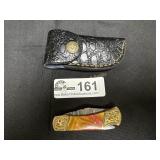 Custom made pocket knife with Damascus blade