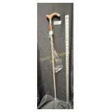 Wood and silver toned derby walking stick