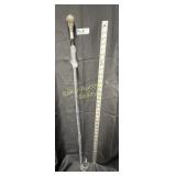 High gloss black cane with 'zebrawood' handle