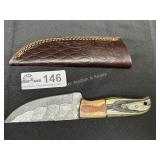 Custom made straight back damascus blade knife