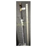 high gloss black shaft with round brown and white